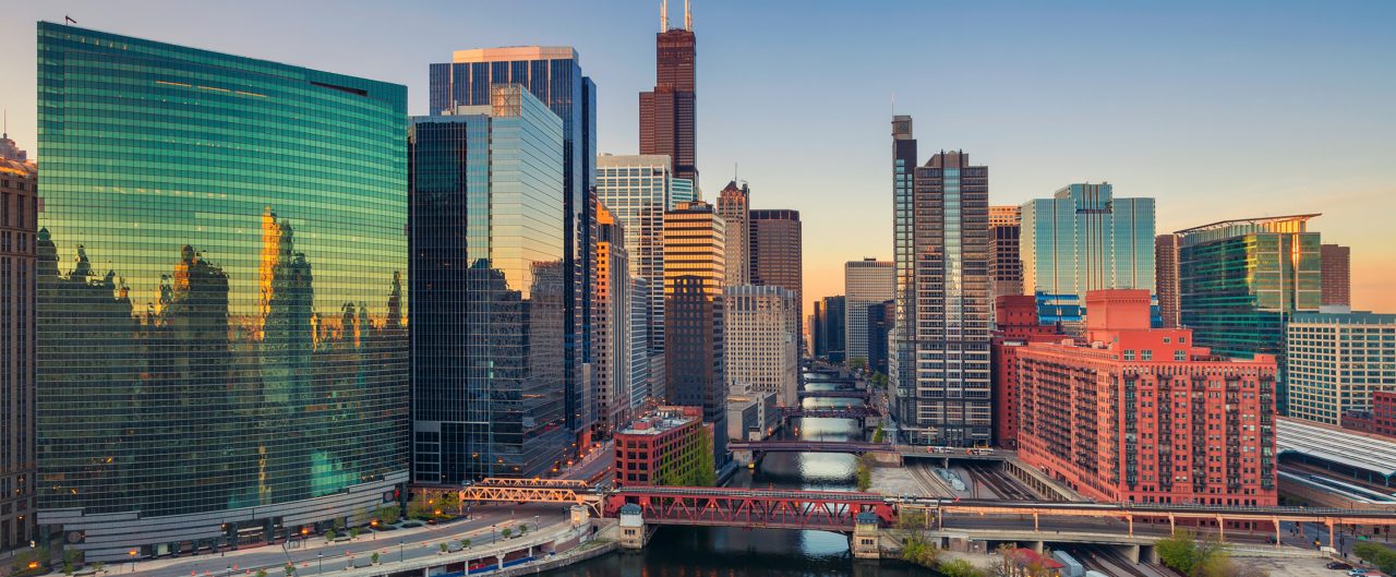 Cityscape image of Chicago downtown at sunrise.