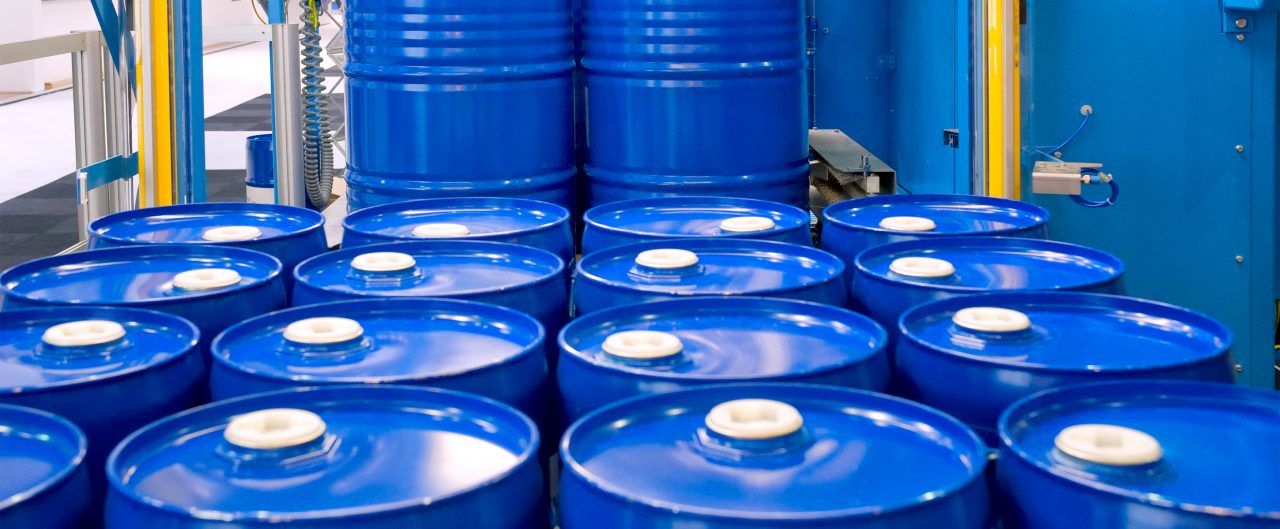 Stacked blue oil drums