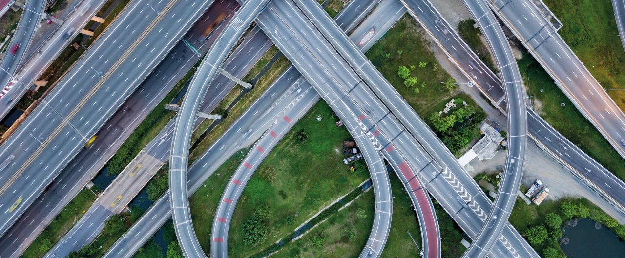 Top view of the intersecting freeway road overpass at the eastern outer ring road of Bangkok, Thailand.