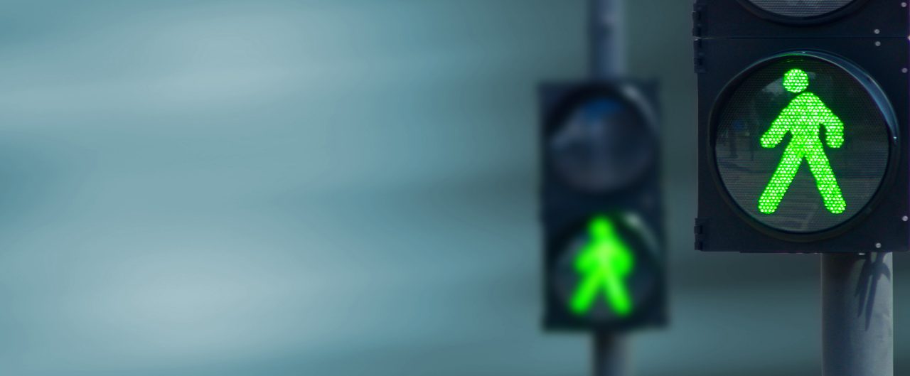 Traffic light with a green walk symbol