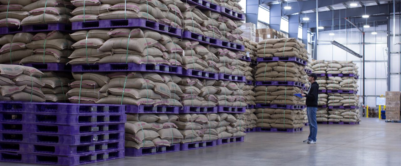 Bags of coffee in a warehouse