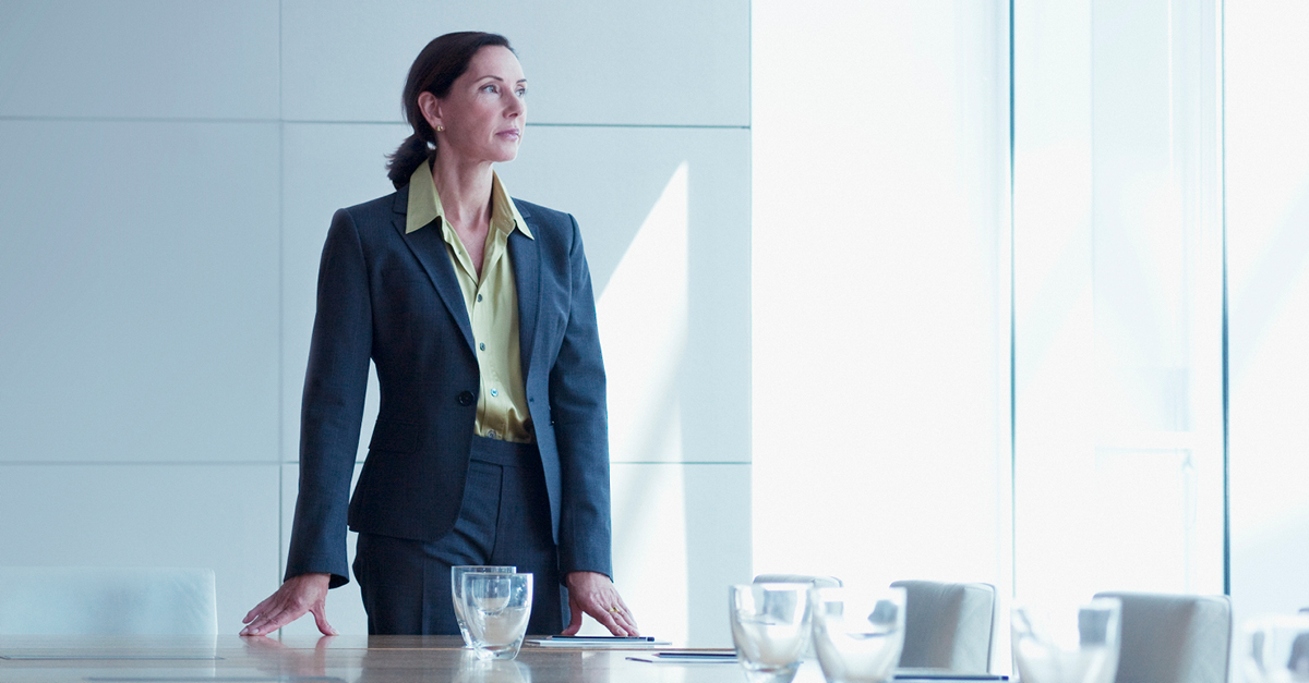 Business woman in a conference room.