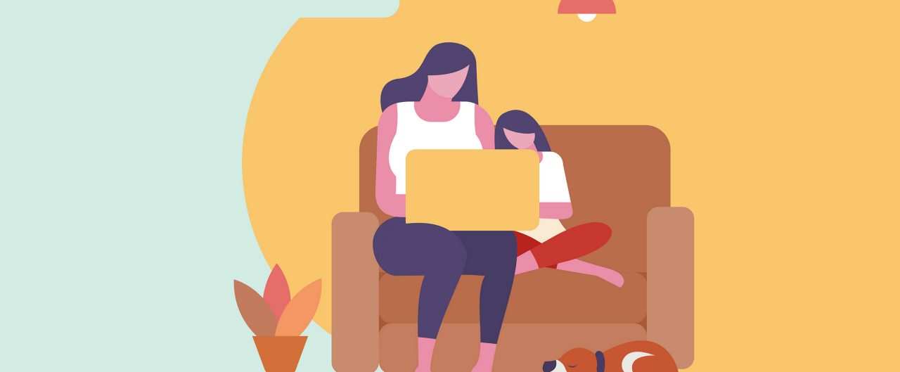 Mother and daughter working on a laptop
