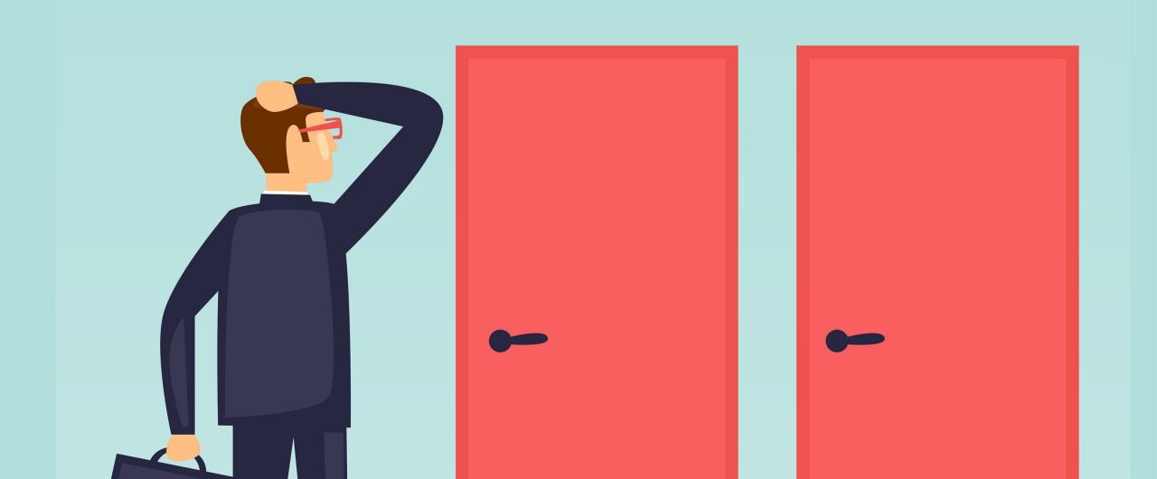 Business man trying to decide between two closed doors