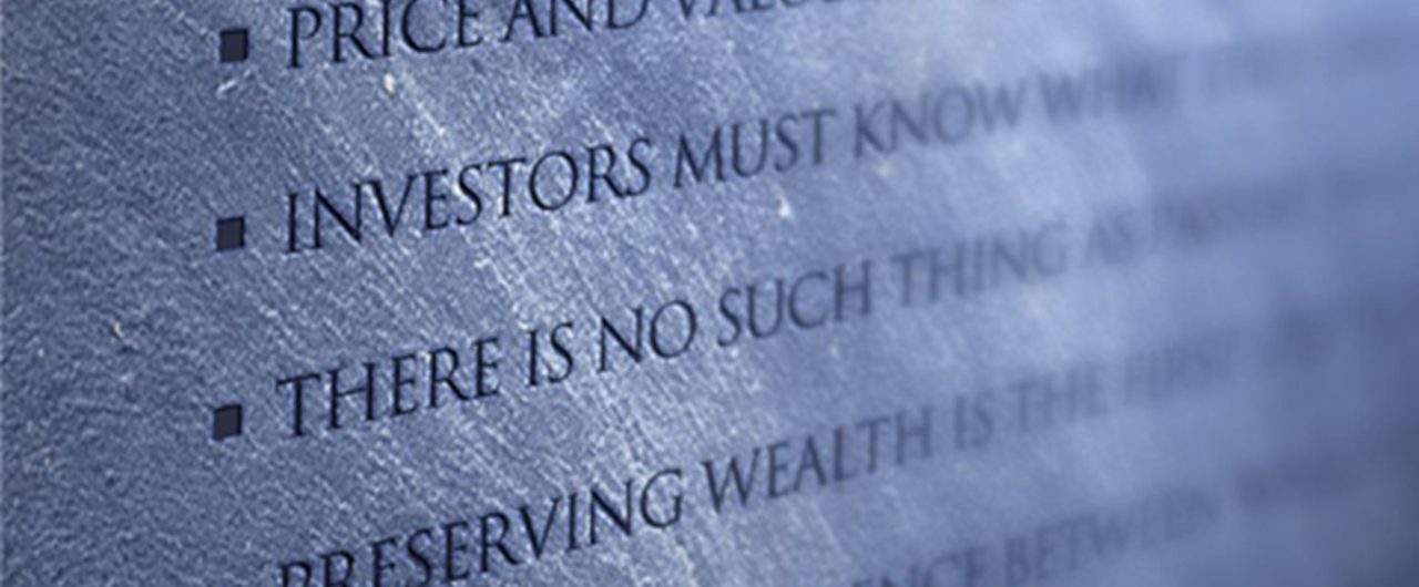 Inspiring Words written on a stone wall 