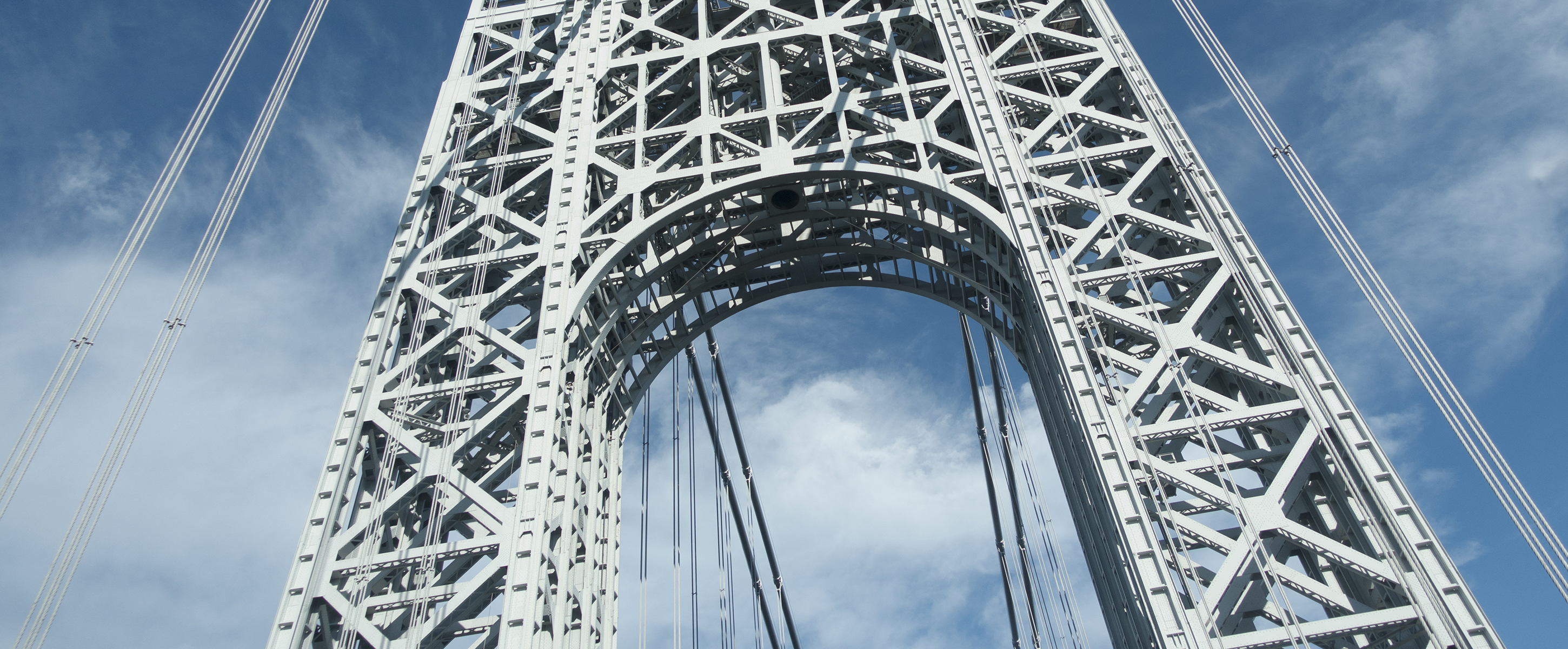 Upward View of George Washington Bridge Tower on Sunny Day