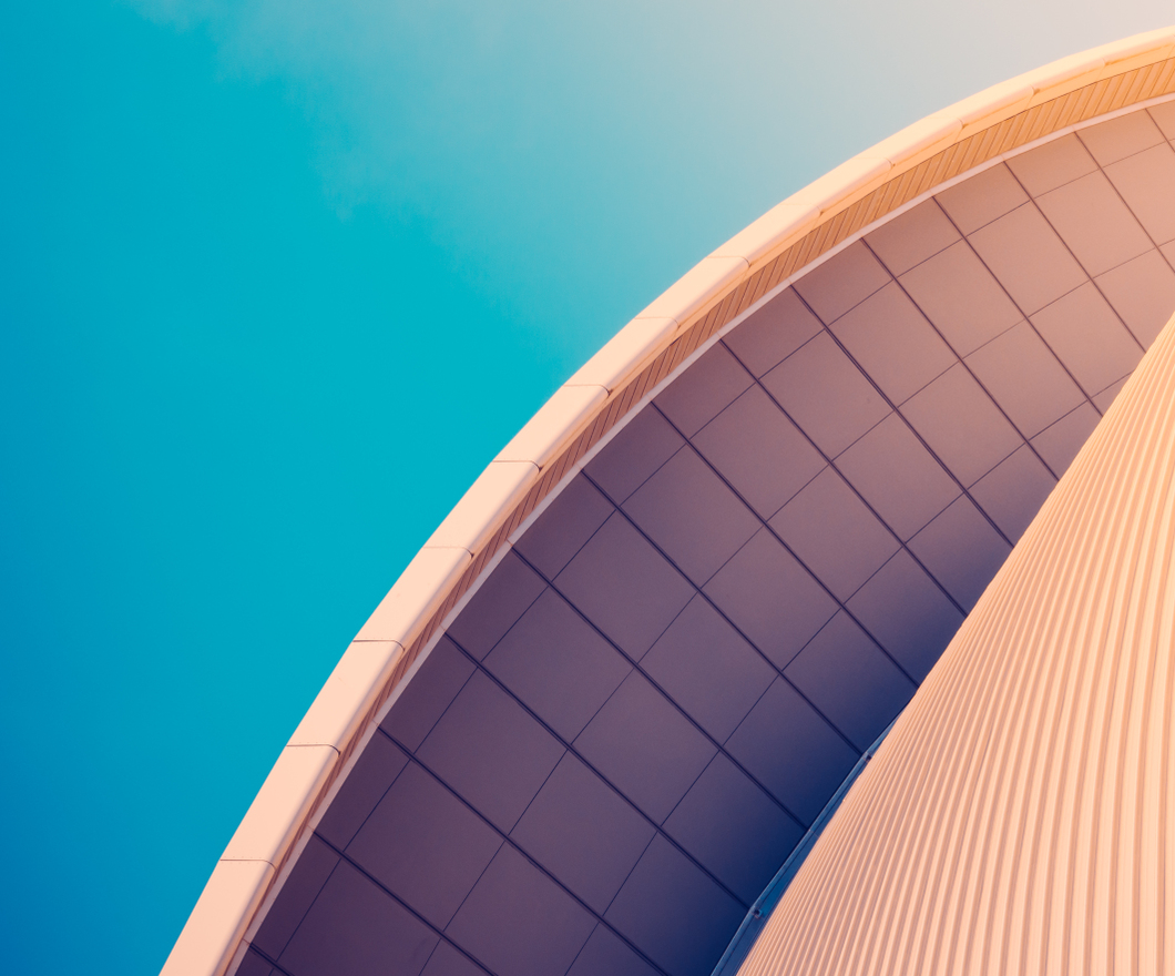 Modern Contemporary Dome-like Architecture Against Blue Sky