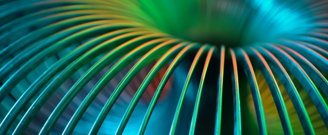 Slinky photographed with gels and continuous lighting