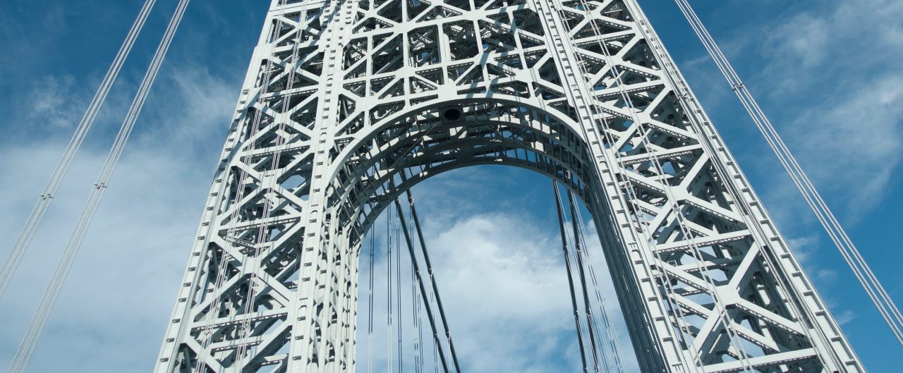 Upward View of George Washington Bridge Tower on Sunny Day