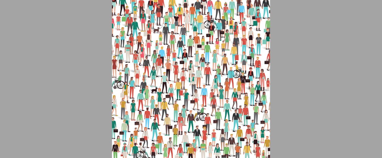 Large and dense crowd of people standing and walking