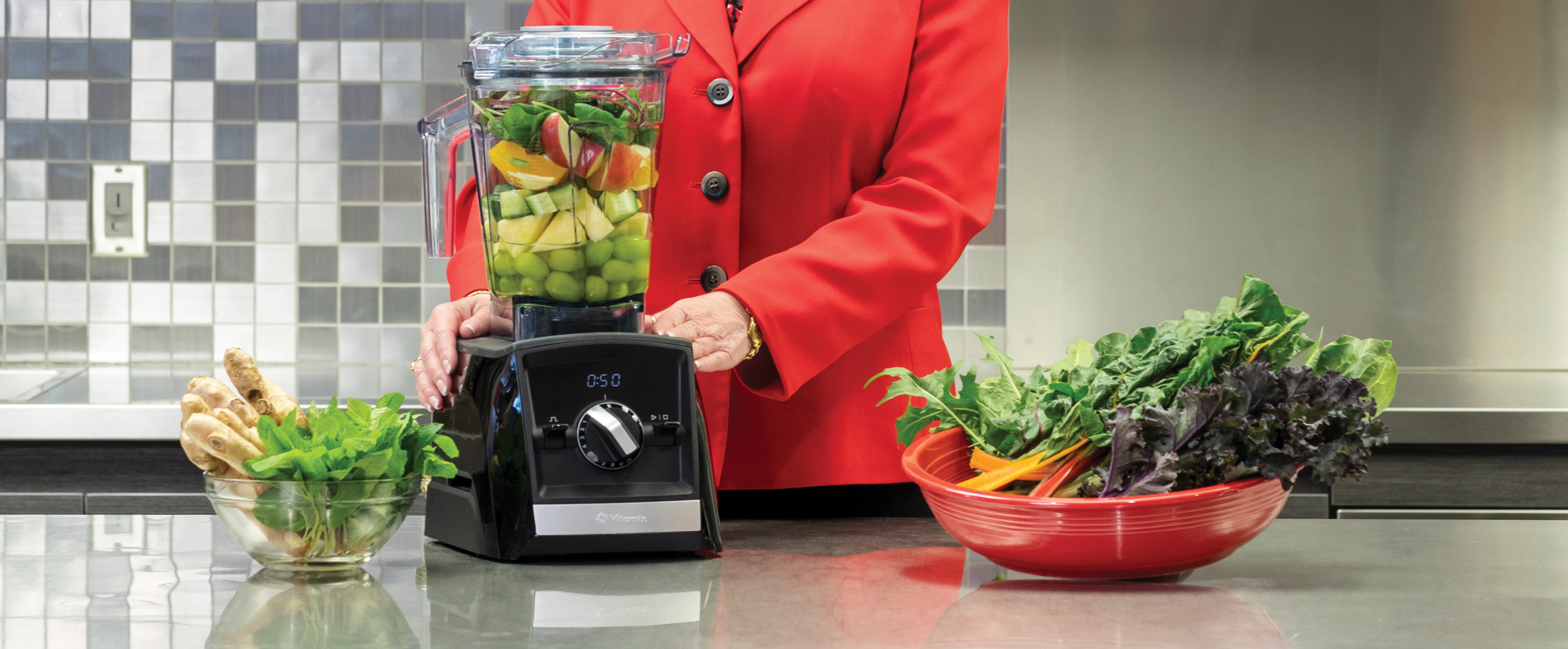 Jodi Berg in kitchen with blender