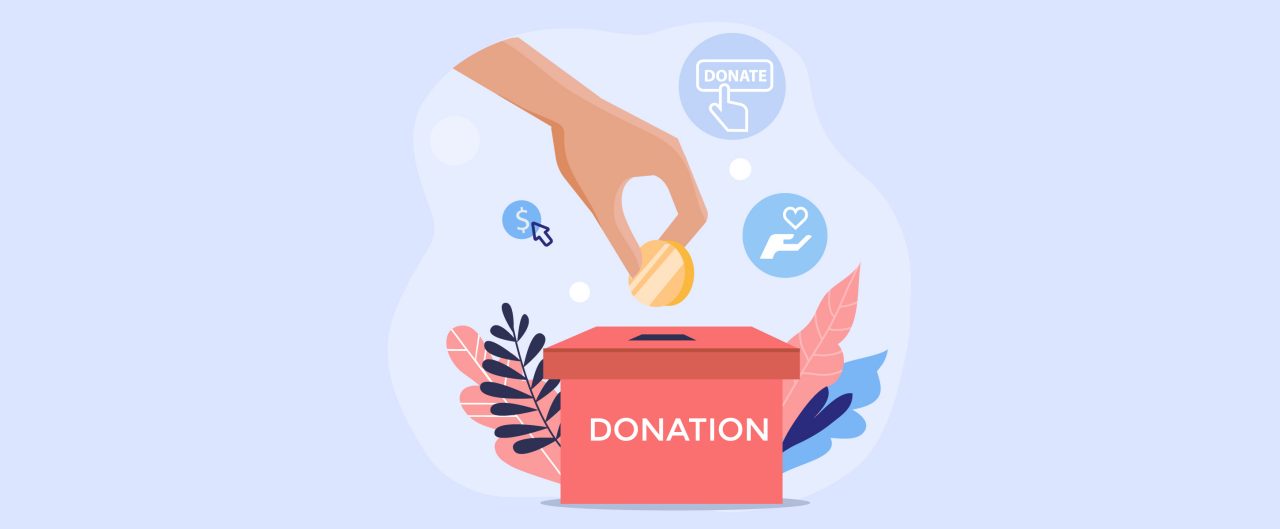 Person putting a coin into a donation box.