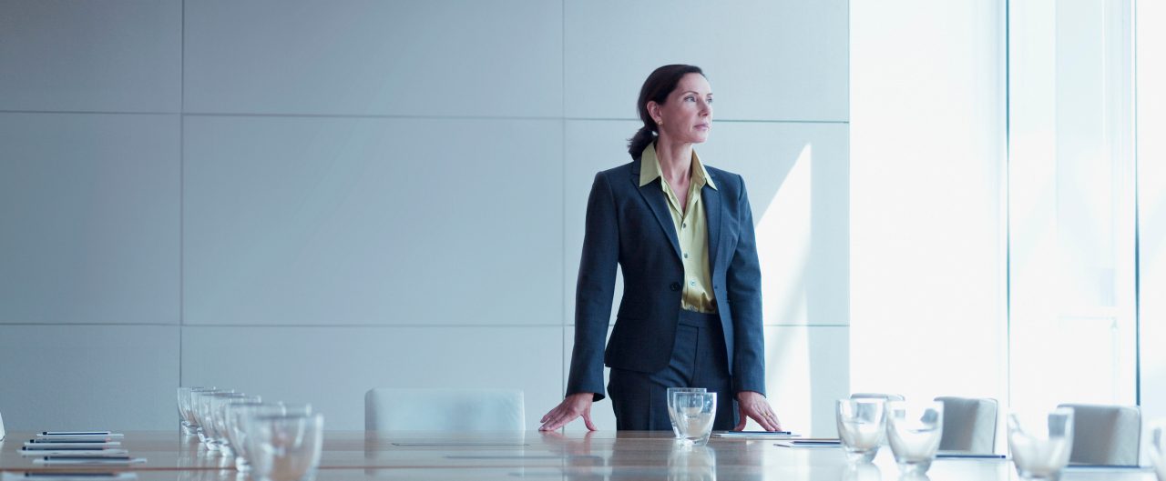Business woman in a conference room.