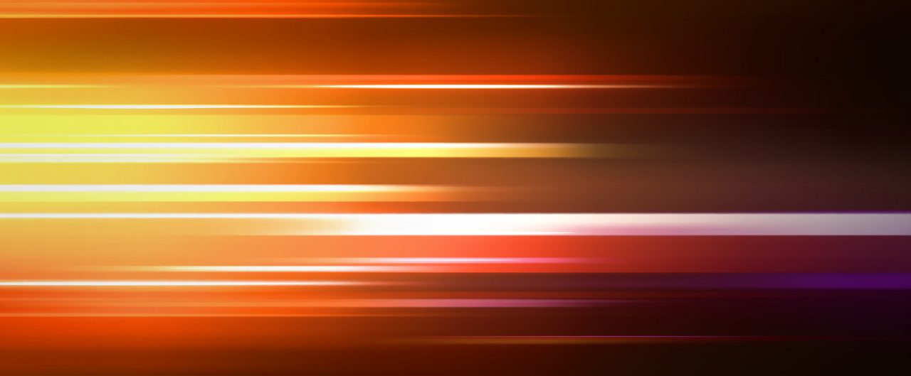 Pattern of gold and red tones streaking across the background