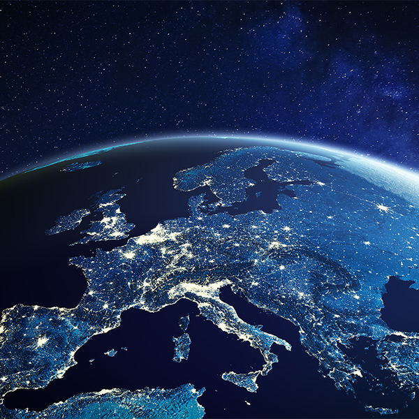 Europe from space at night with city lights showing European cities in Germany, France, Spain, Italy and United Kingdom