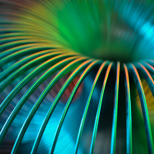 Slinky photographed with gels and continuous lighting