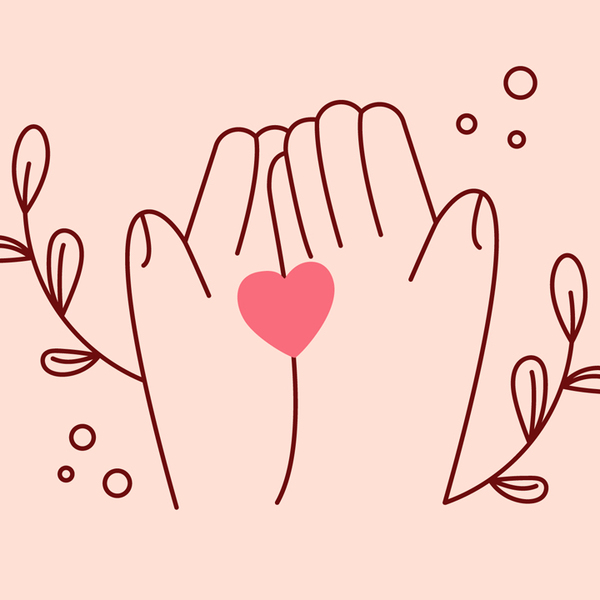 line art of hands & heart on pink background