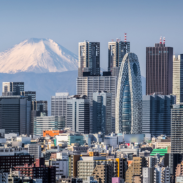 High building at Tokyo shinjuku and Mt. Fuji with snowy mountain in the background
