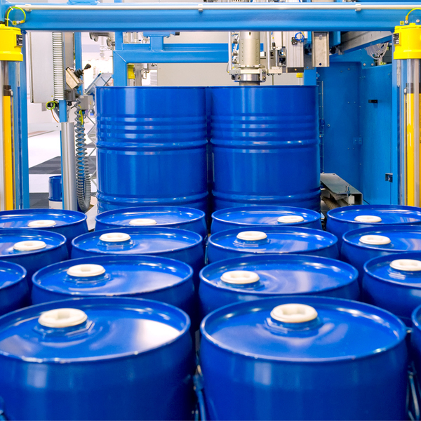 Stacked blue oil drums