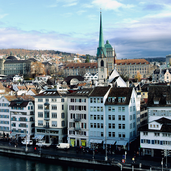 Zurich skyline with houses, churches, still water 