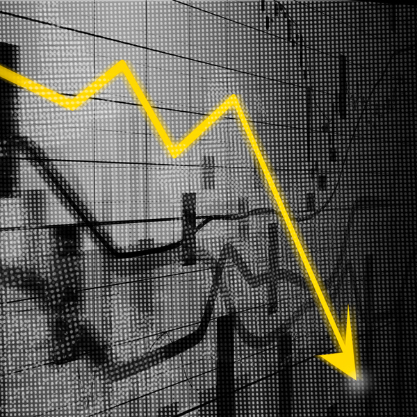 Yellow downward trending recession arrow on black financial graphs in background