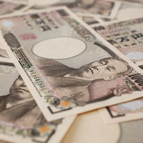Japanese Yen bills scattered in a pile