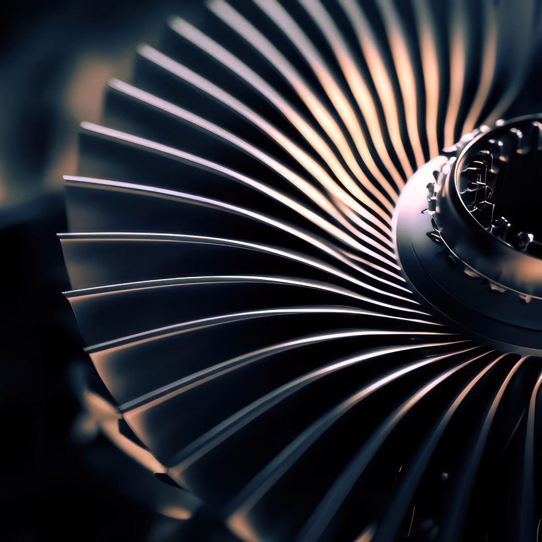 Close-up of a turbine engine, showcasing intricate details and metallic textures