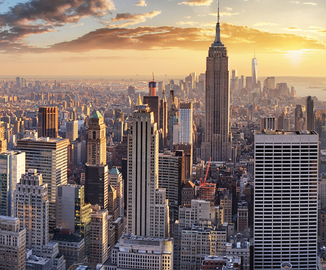 New York City skyline with the empire state building at sunset