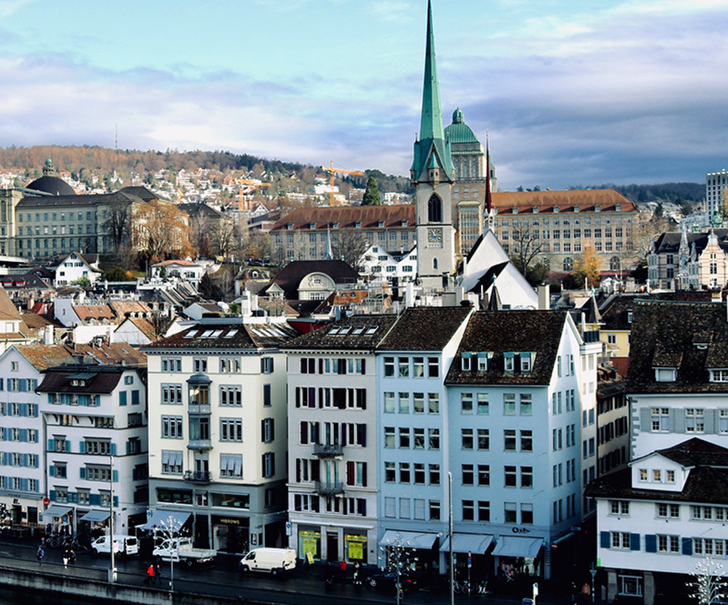 Zurich skyline with houses, churches, still water 