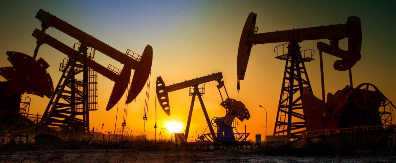 Oil pumping unit in sun