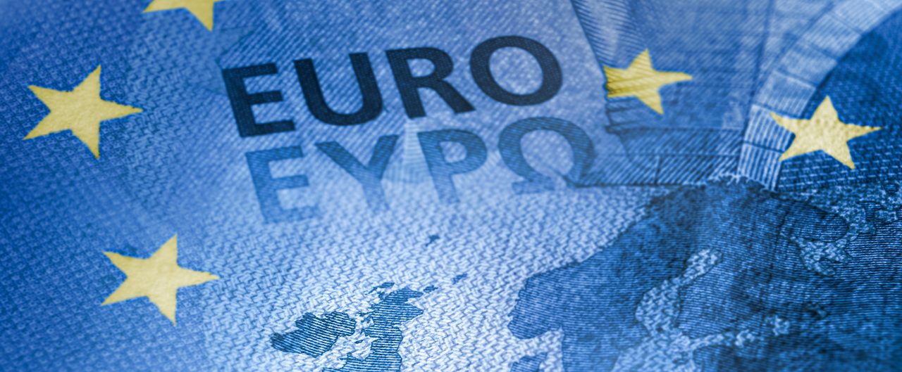 The E.U. flag, Euro bank-note, and map of Britain overlapping each other to illustrate Brexit
