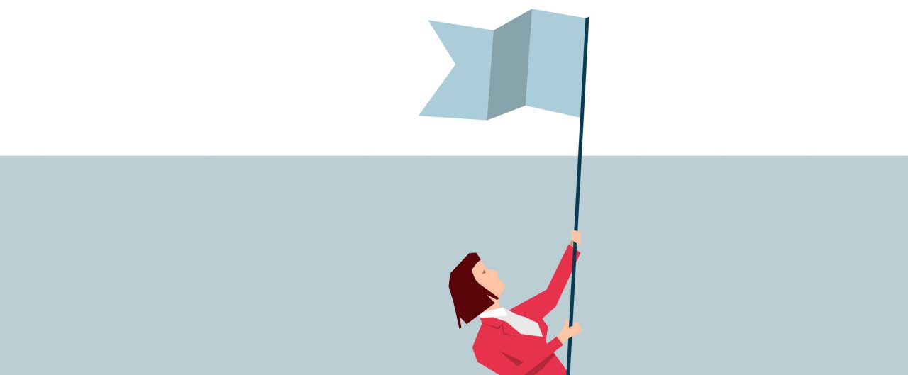 Cartoon woman in pink suit standing at the top of a mountain waving a flag 