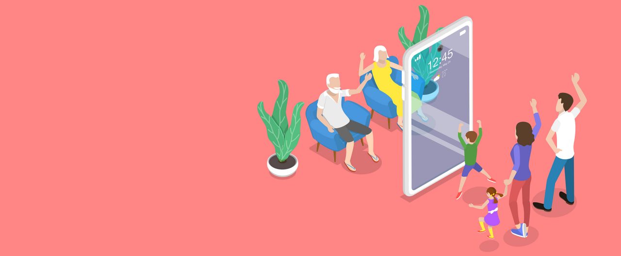 A senior couple and a young family are separated from each other by a giant life-size cell phone. They wave to each other through the transparent cell-phone.