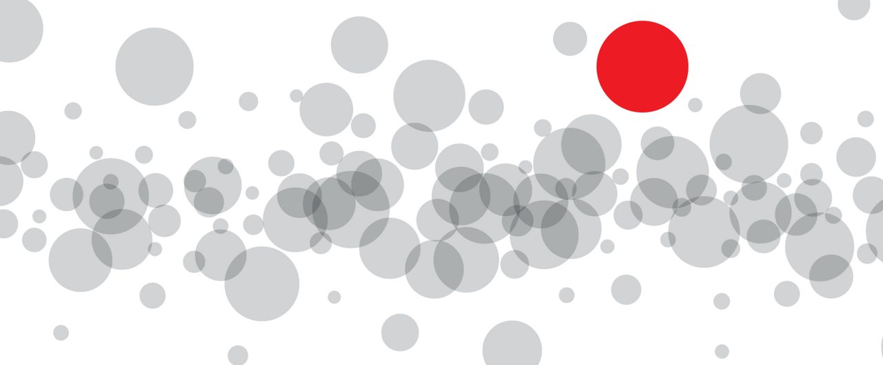Series of gray bubbles with one large red circle.