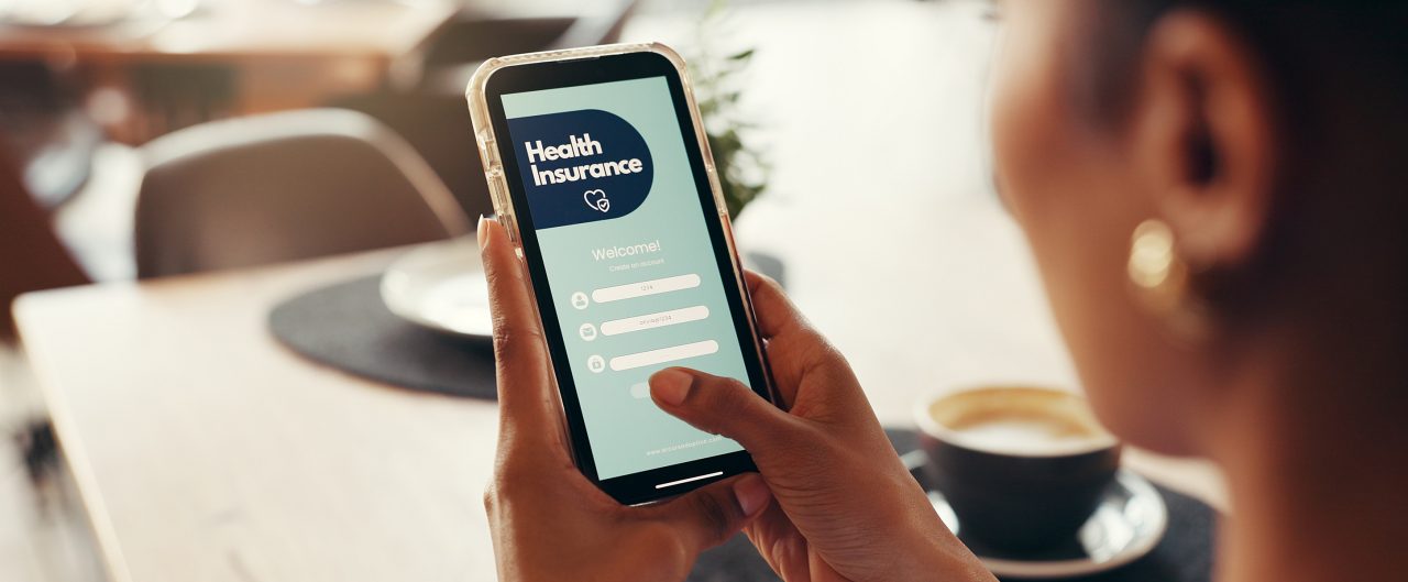 Phone screen, health insurance and hands of woman for digital application, app and check in. Claims status, membership benefits and medical cover with person for login and online review in cafe.