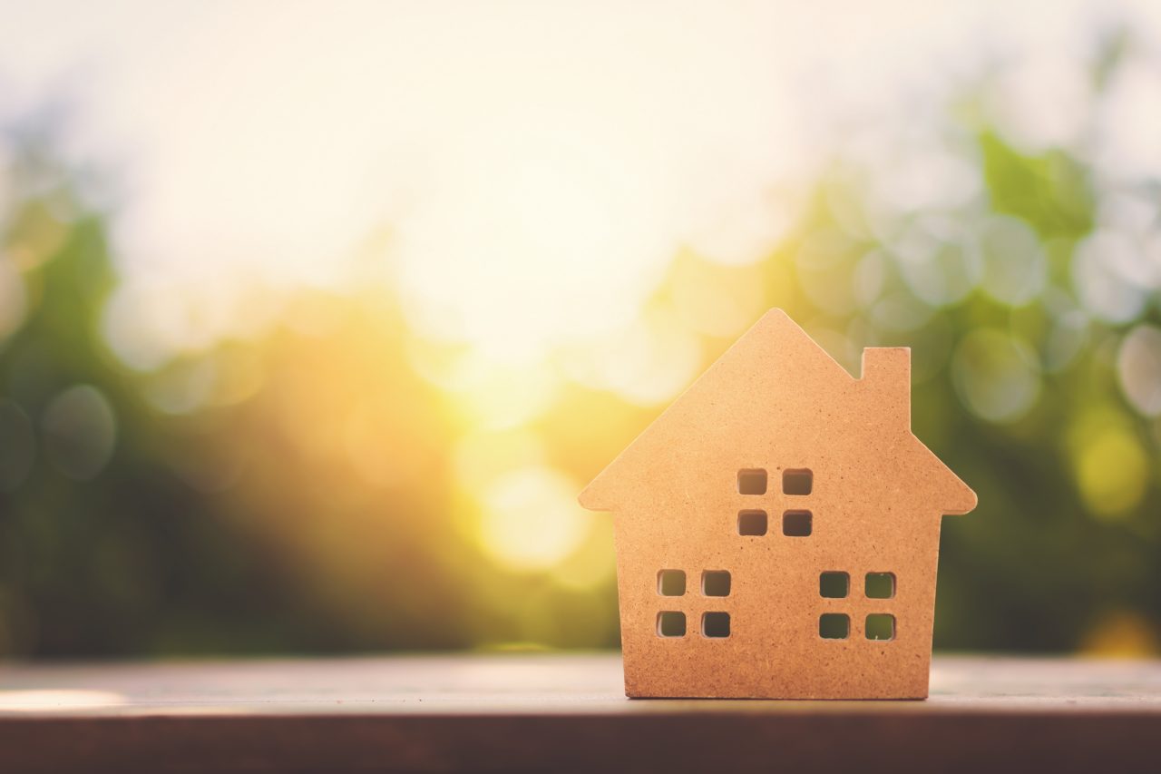 Wood house model on  wood background